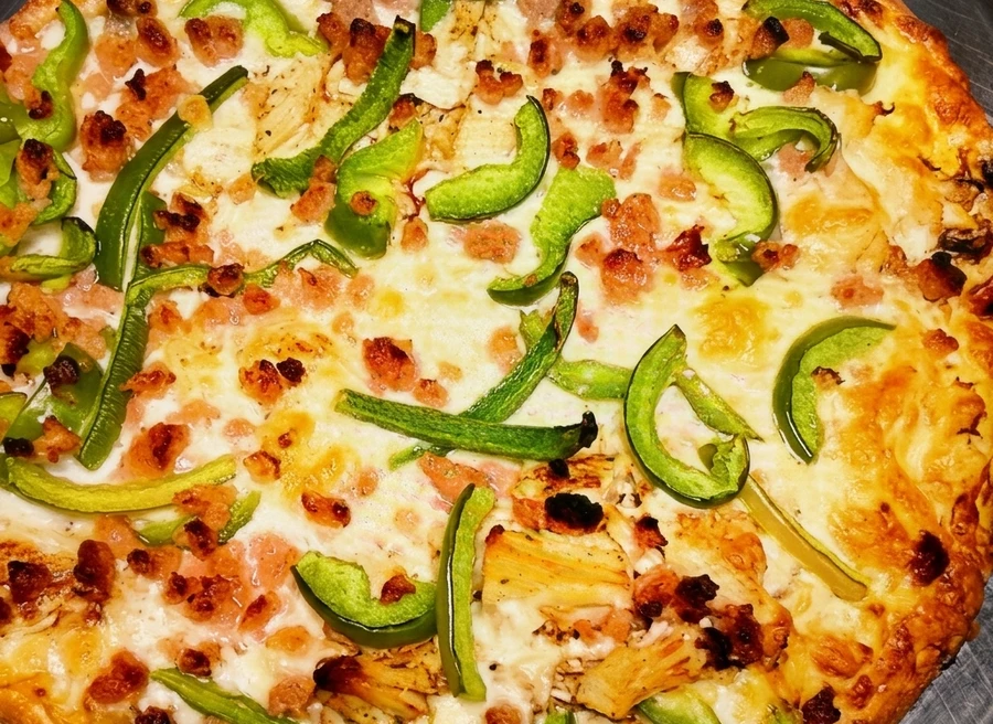 Classic pizza made with fresh daily dough and sauce at Sal's Famous 82 St Edmonton